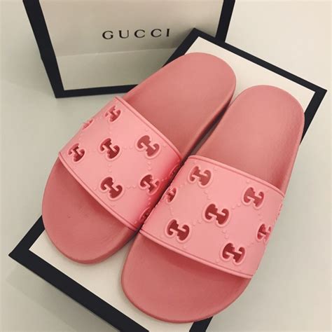 pink and purple gucci slides